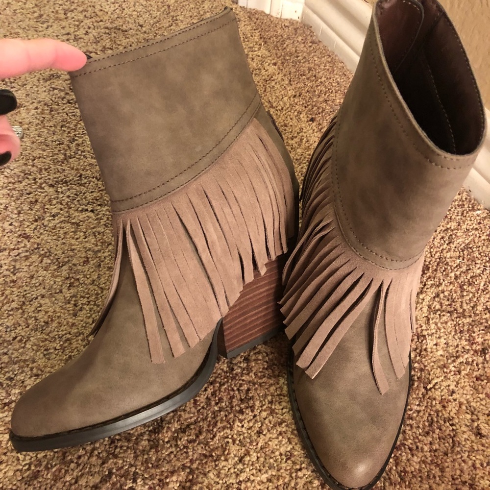 Fringe booties. Never worn outside my closet :)